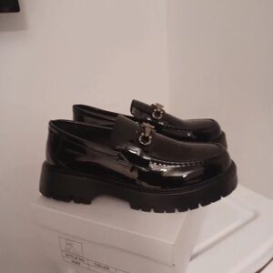 Elegant Black Patent Loafers with Gold Detail